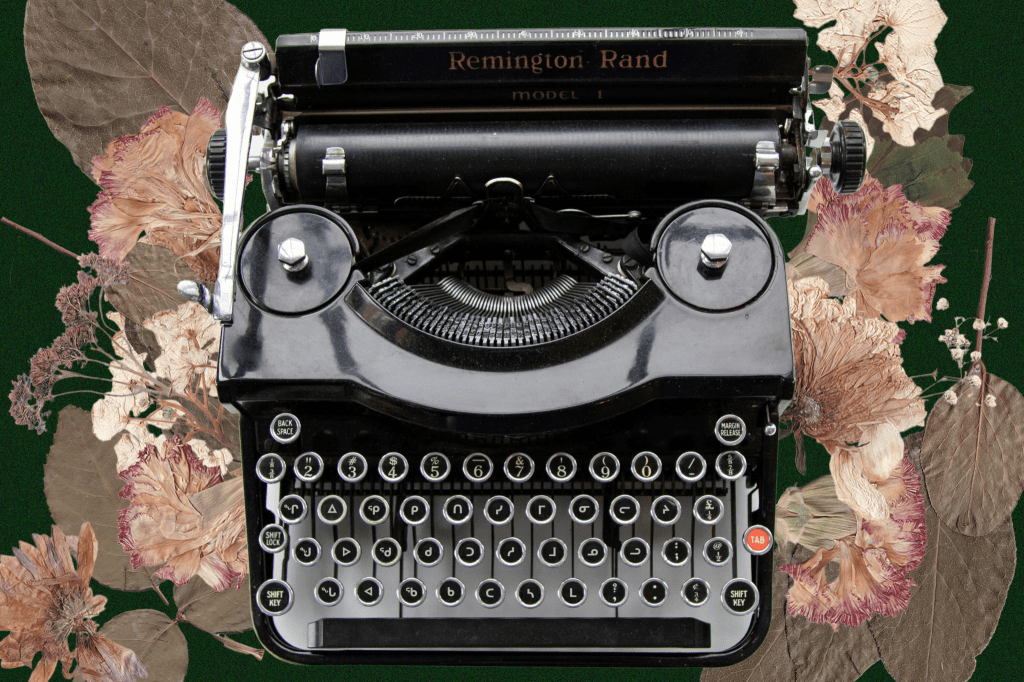 A graphic of an antique typewriter resting on a bed of pressed flowers and leaves. 